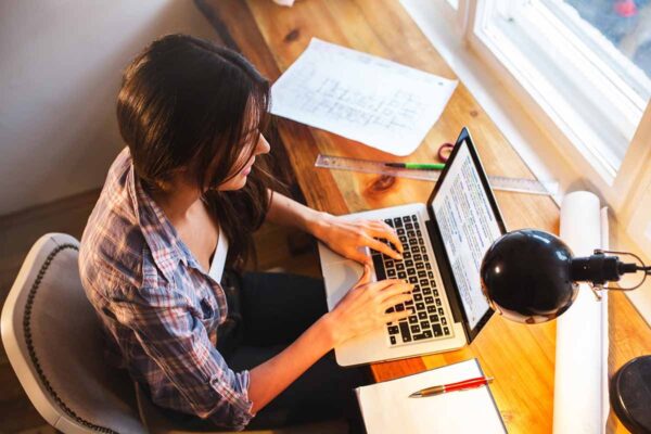 Copywriter working on laptop