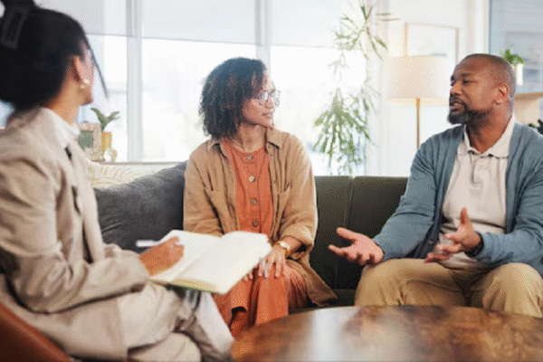 Couple therapy and discussion with notes in office