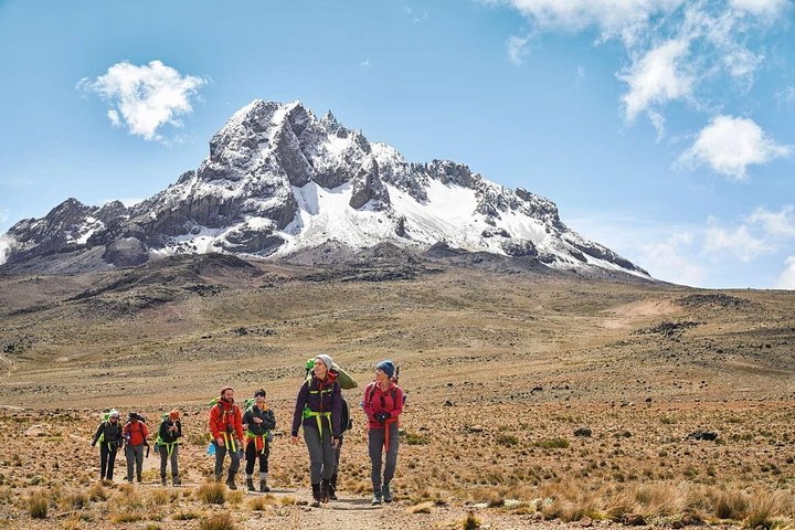 Mount Kilimanjaro trekking tours with climbers reaching Africa’s highest peak