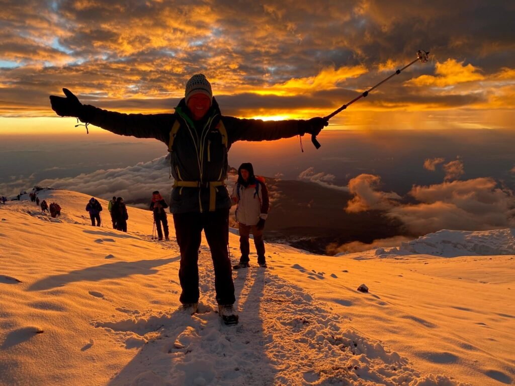 Mount Kilimanjaro trekking tours with climbers reaching Africa’s tallest peak