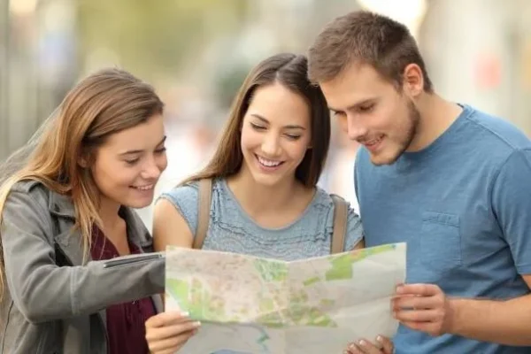 Traveler frustrated while following the wrong tour guide on a scenic road trip.