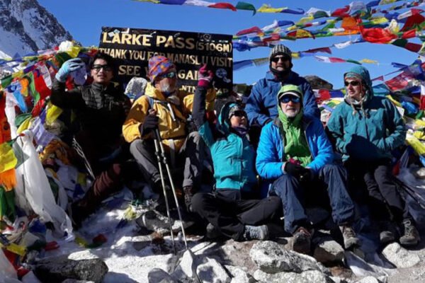 Scenic view of the Manaslu Circuit Trek with snow-capped Himalayan peaks, rivers, and traditional Nepali villages along the trail