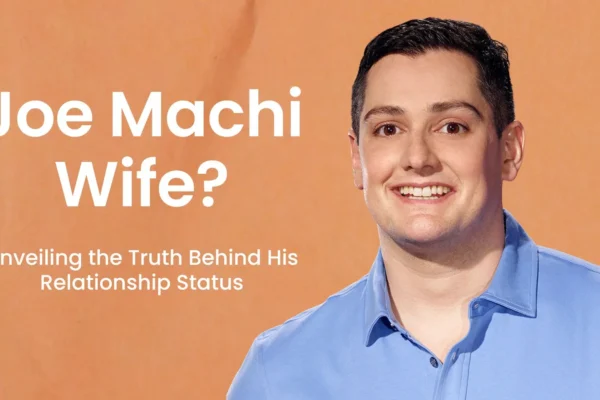 comedian Joe Machi performing on stage with a microphone under spotlight