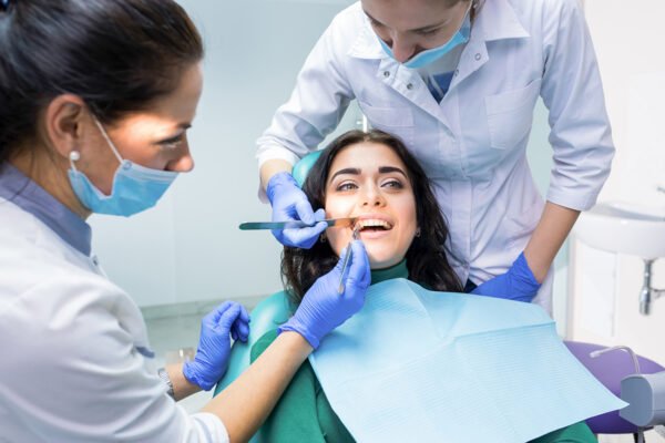 Dentist advising a patient on maintaining a bright and healthy smile