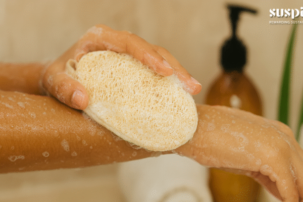 A person using sponge to take their bath