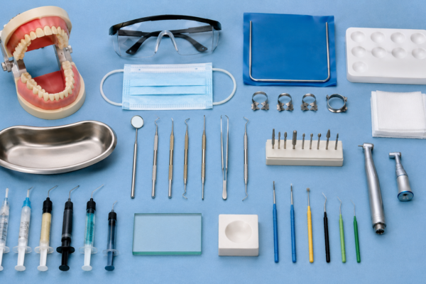 Dental instrument setup on blue cloth